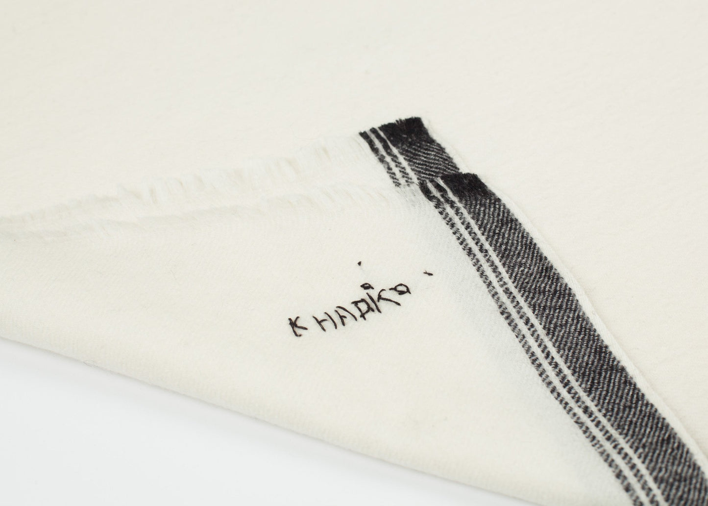 Edged Wool Scarf in Off White Khadi & Co.